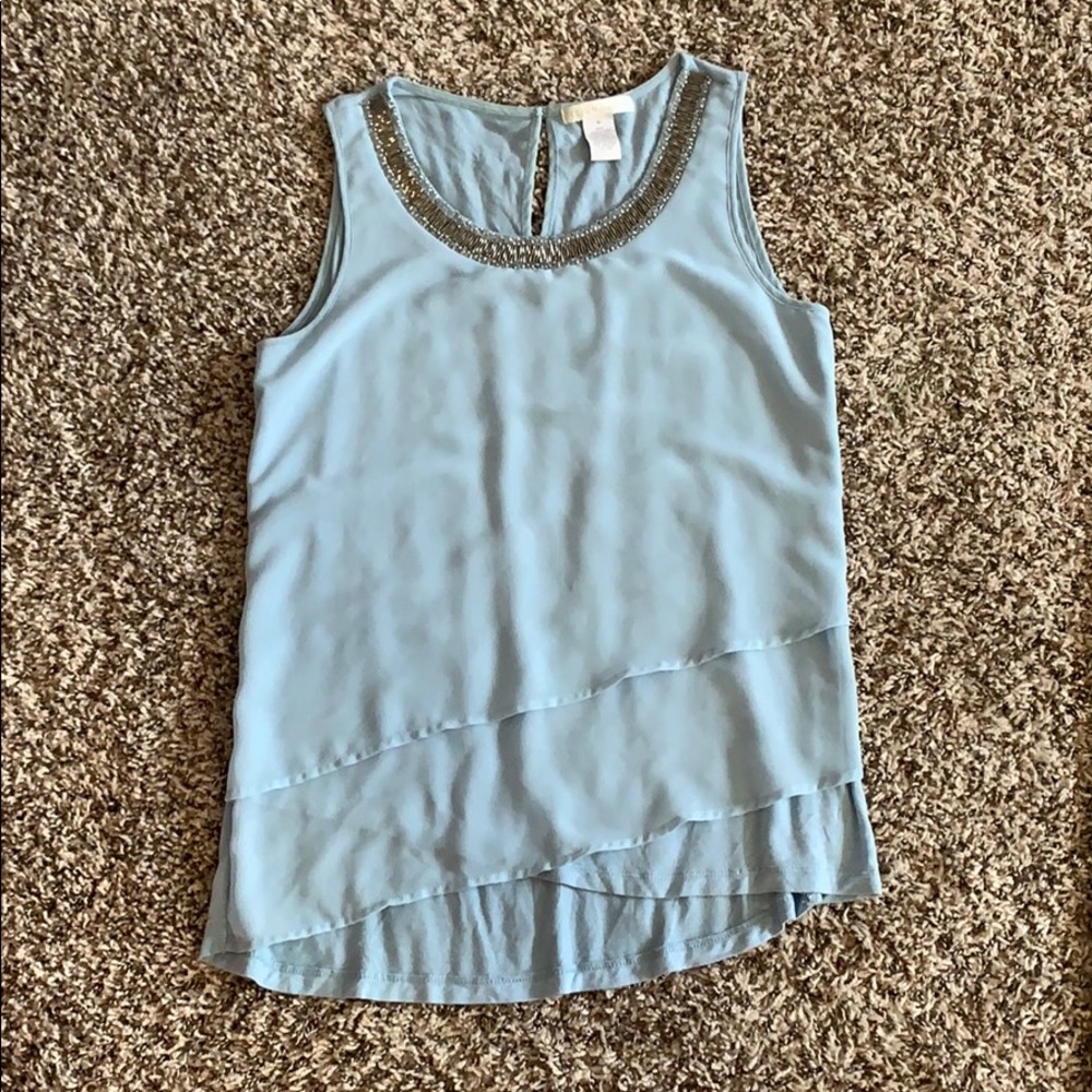 Blue sleeveless blouse